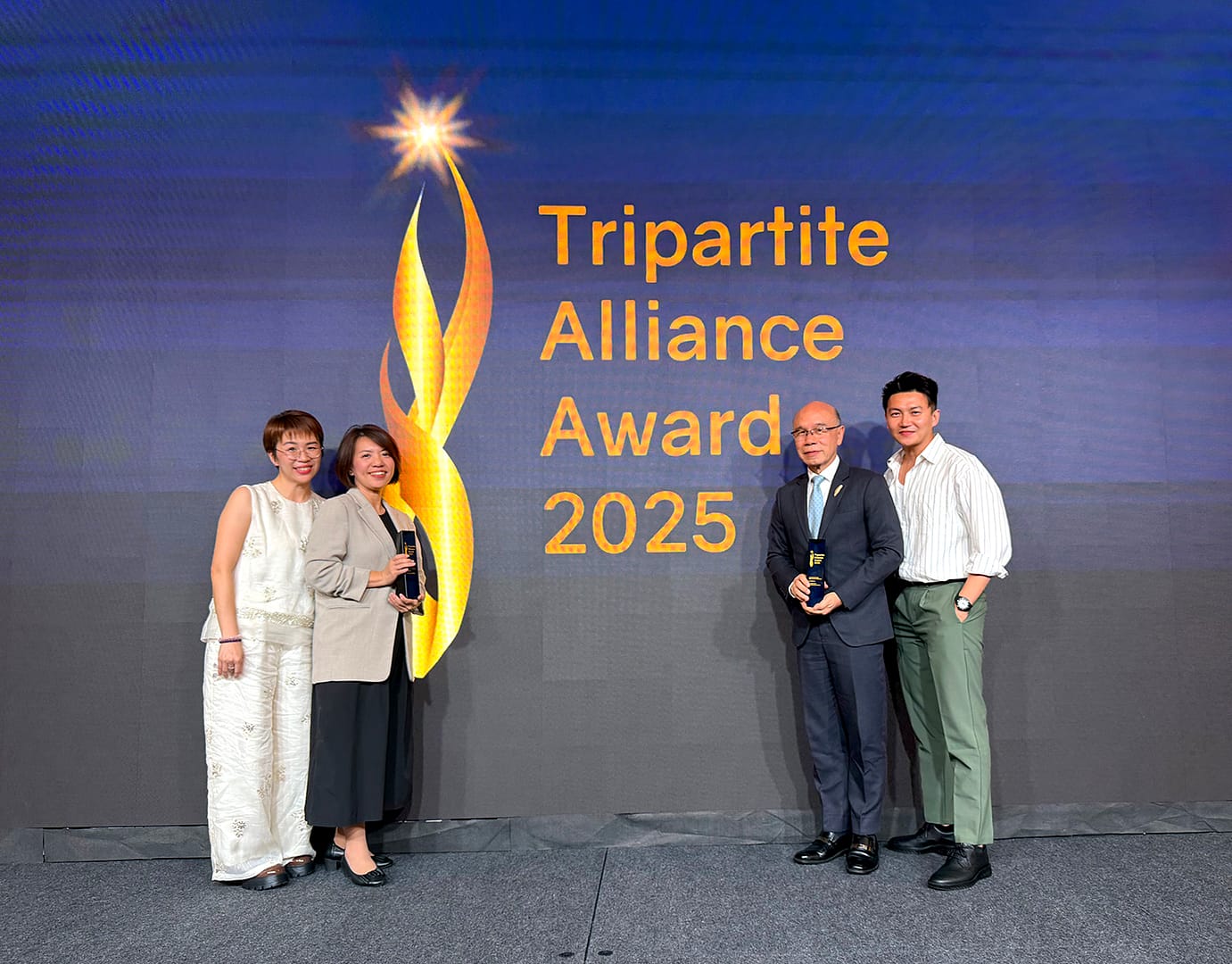 Mr Ho Nai Chuen and team