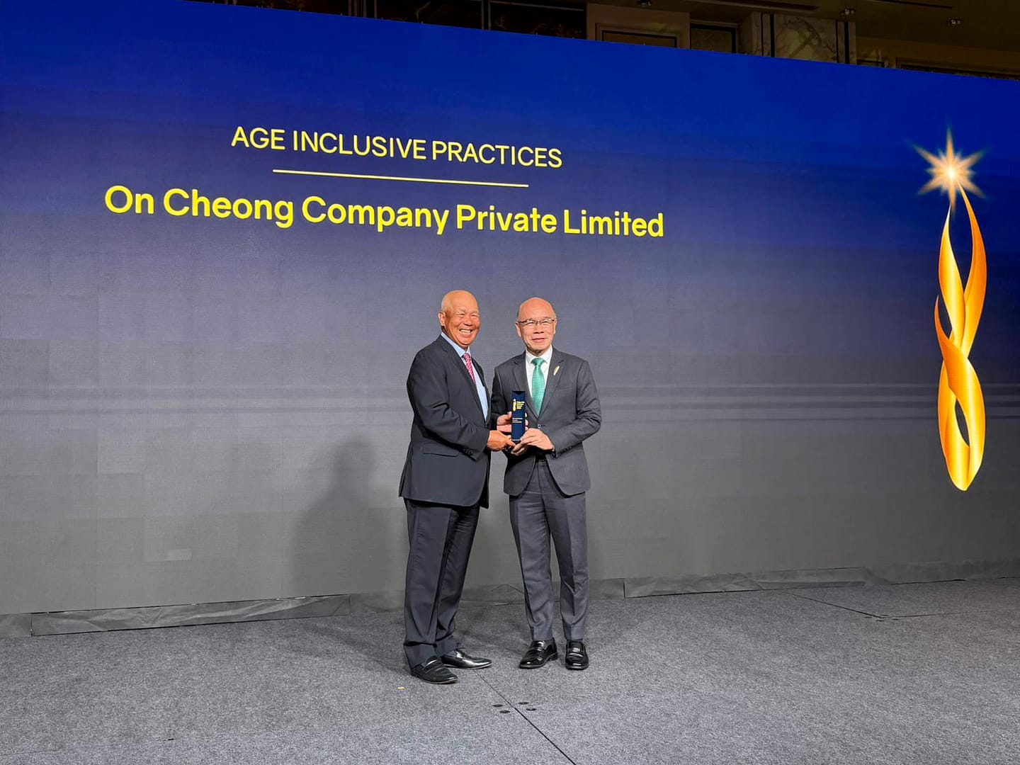 Mr Ho Nai Chuen with Mr Bob Tan