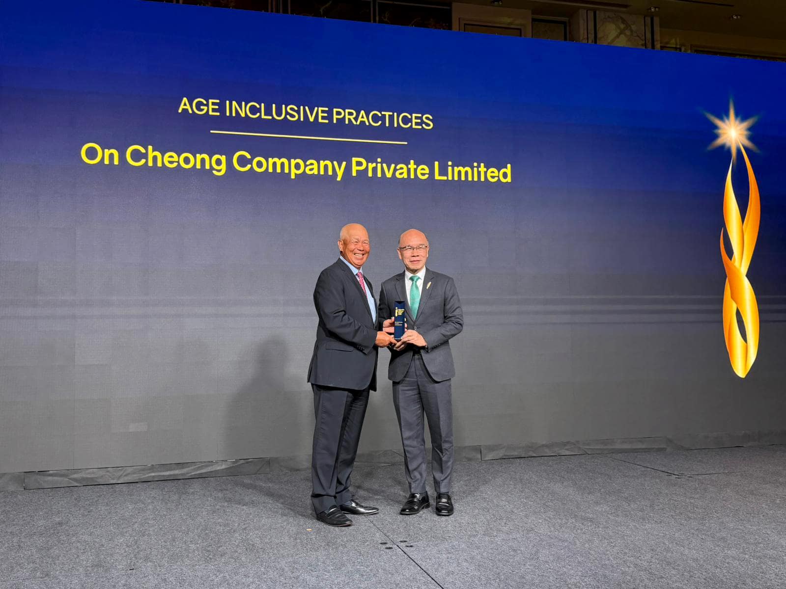 Mr Ho Nai Chuen with Mr Bob Tan