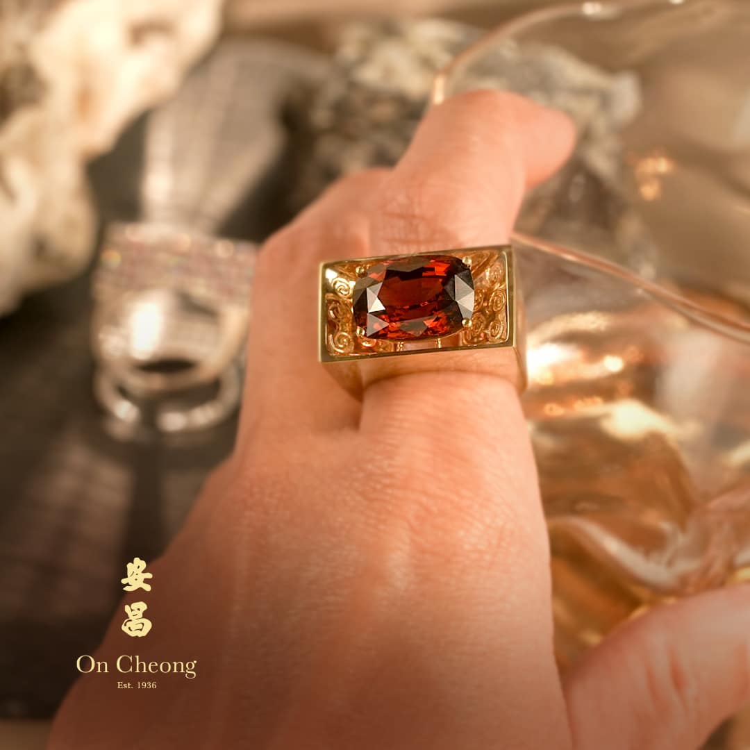 Fortress Flame Garnet Diamond Ring on hand